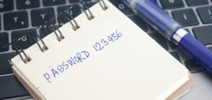 64011234_writing-password-on-a-sticky-note